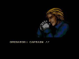 A screenshot from the 1989 video game "Zero Wing." The screen depicts the man in blue clasping his hand and the words "OPERATOR: CAPTAIN ! !" 