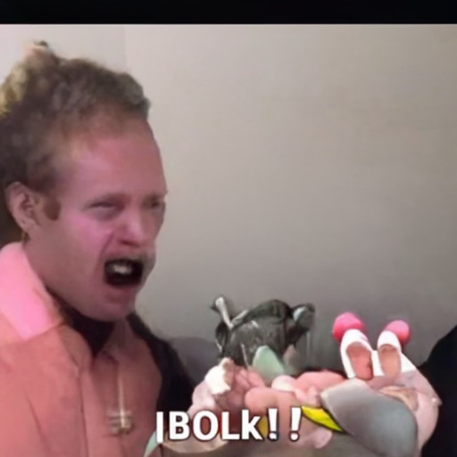 [Description] A video of PERSON laughing with his wife, PERSON, holding a cupcake. [Text] BOLk!!